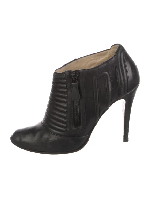 Christian Louboutin Leather Moto Boots in black Leather from The RealReal