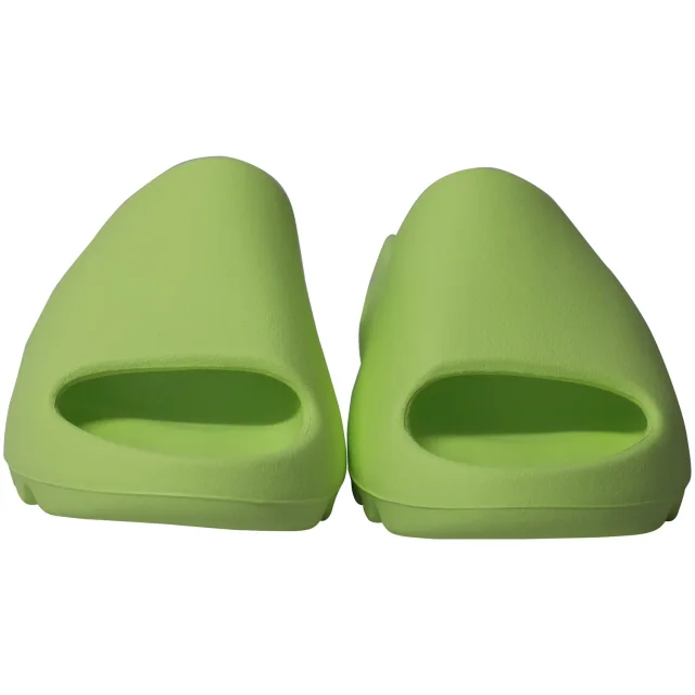 Adidas Yeezy Slides in Glow Green Plastic in green, photo 2 of 6 from ShopSimon