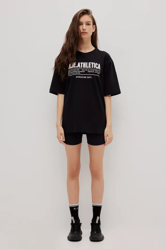 Athletica Motivation Tee 102 in Black from Aje, photo 1 of 1