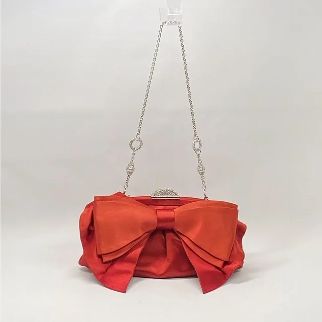Judith Leiber Madison Satin Bow Clutch Bag in red Satin from Poshmark