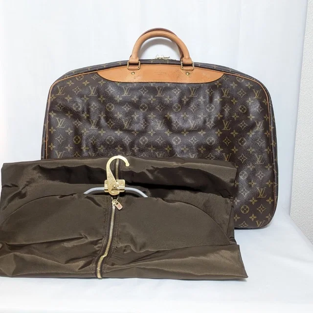 Louis Vuitton Alize Anne Poche Monogram Boston Bag Garment in Leather from The Reluxe