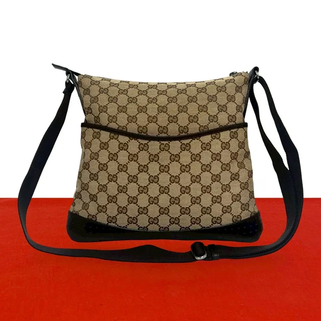 Gucci GG Monogram Canvas Perforated Leather Shoulder Bag Crossbody Brown Beige in Brown Coated canvas from The Reluxe