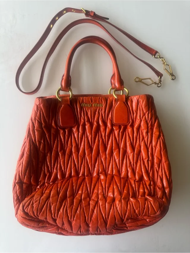 Miu Miu Matelass Nappa Leather Satchel Orange Ruched Top Handle Crossbody Bag in orange Nappa leather from Poshmark