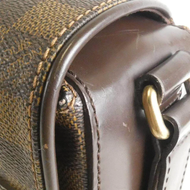 Louis Vuitton Damier Spencer Coated Canvas Shoulder Bag in Bronze Canvas from LuxUness, photo 7 of 10