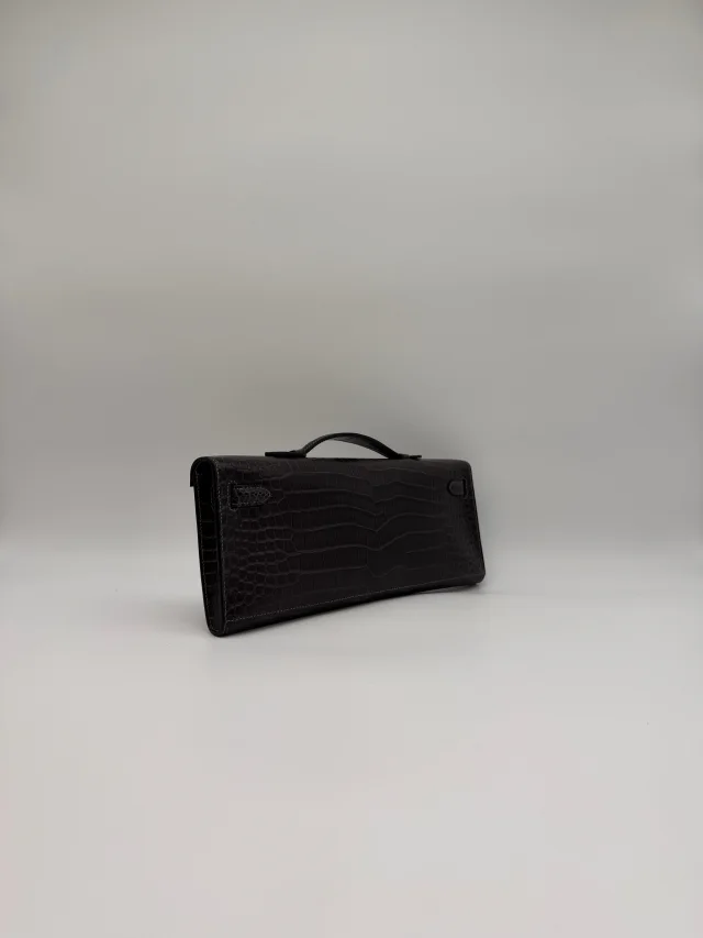 Hermès Kelly Cut Graphite Matt Porosus Permabrass Hardware in Grey Leather from Luxury Promise, photo 6 of 11