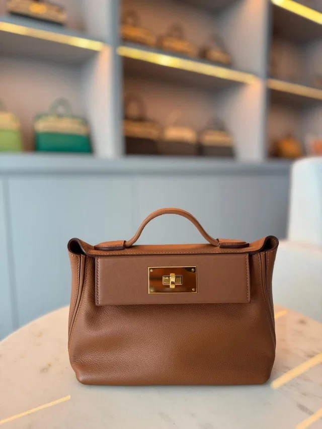 Hermès 24/ 21 Gold Evercolor in Gold from Luxury Promise