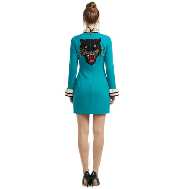 Gucci turquoise ruffle jersey dress with panther in Blue from Designer Revival, photo 2 of 2