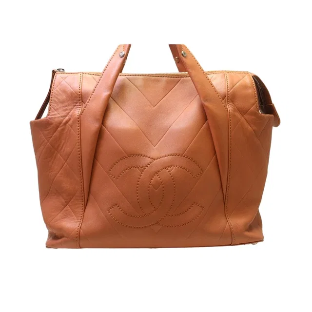 Chanel CC Logo Lambskin Tote Bag in Lambskin from The Reluxe