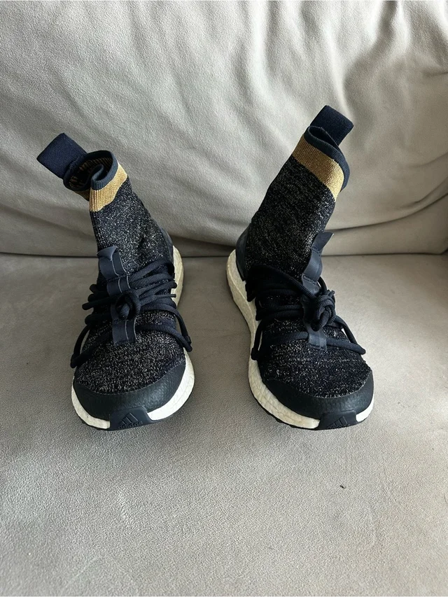 Stella McCartney Black Knit Sock Sneakers With Gold Accent in black|gold from Poshmark
