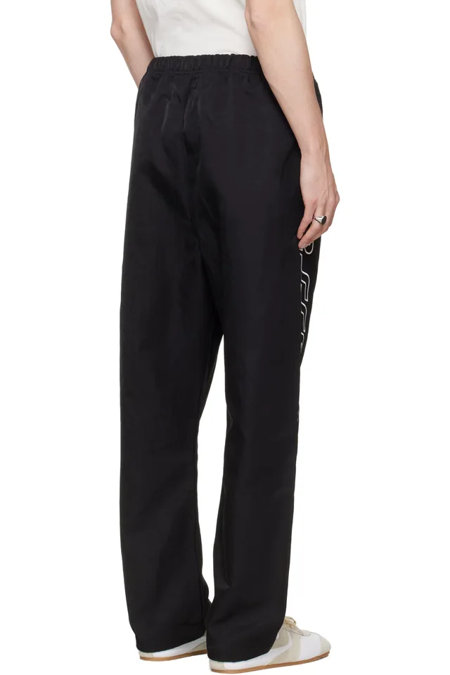 Fear of God ESSENTIALS Black Active Trace Relaxed Drawstring Track Pants, photo 3 of 4 from SSENSE