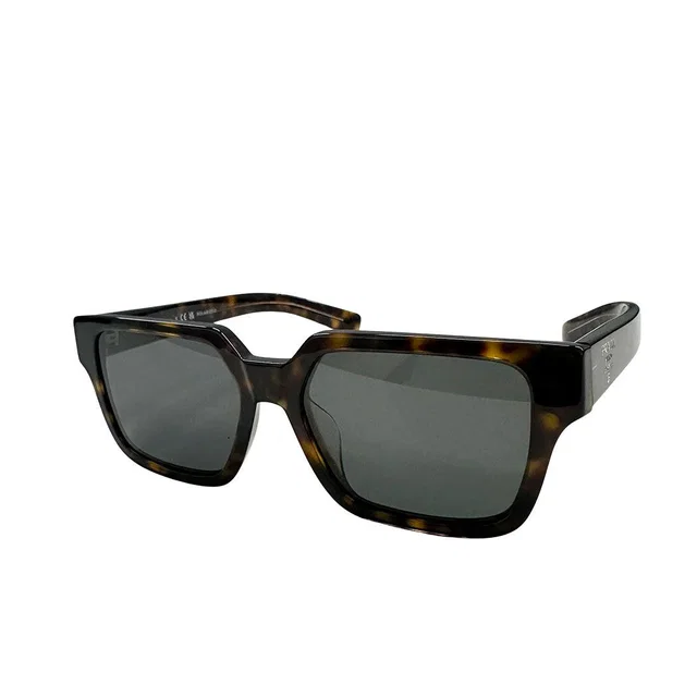 Prada Sunglasses Brown 58 17 Cool Eyewear in Brown from The Reluxe