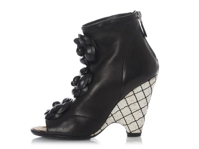 Chanel Black Lambskin Camellia Wedge Booties in Black Lambskin from Ann's Fabulous Finds