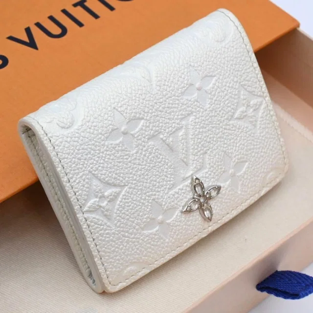 Louis Vuitton Empreinte Envelope Line Stowe White Wallet in White Leather from The Reluxe