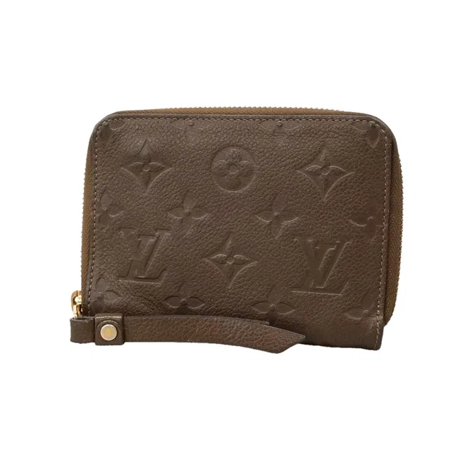 Louis Vuitton Wallet Monogram Empreinte Portefeuille Secret Compact Ombre from The Reluxe