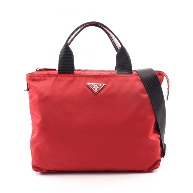 Prada Tote Bag Triangle Logo 2-Way Red Nylon Saffiano Leather in Red Saffiano leather from The Reluxe