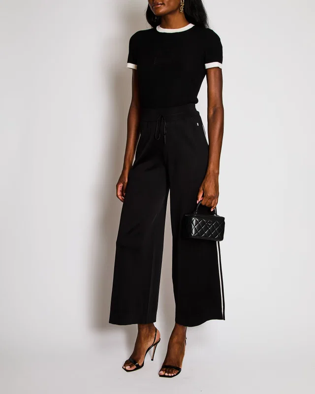 Chanel Black Straight Leg Trackpants with White Side Stripe and White CC Logo Size FR 34 (UK 6) in Black Silk from Sellier