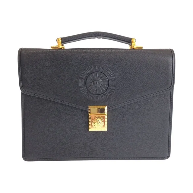Versace Vintage Sunburst Black Leather Clutch Business in Black Leather from The Reluxe