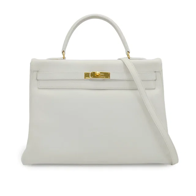 Hermès Kelly 35 Retourne White Veau Graine Hand Shoulder Bag 1995 Circle Y Gold Hardware in White Calfskin from Luxury Promise