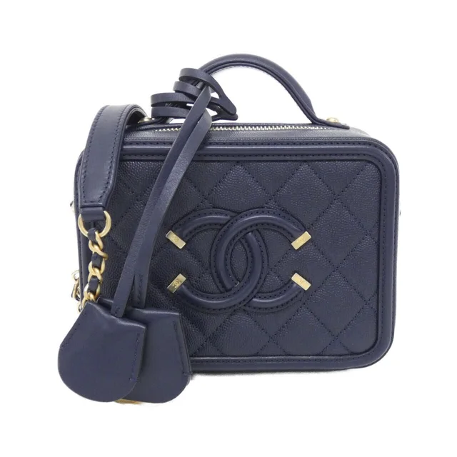 Chanel Bag Handbag Navy in Navy Caviar leather from The Reluxe