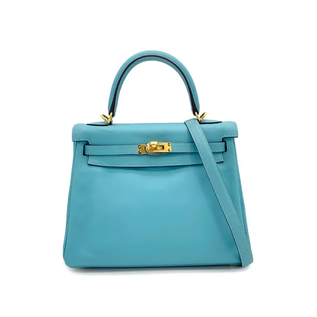 Hermès Kelly 25 Retourne Blue Saint Cyr Swift Hand Shoulder Bag 2015 T Gold Hardware in Blue Swift leather from Luxury Promise