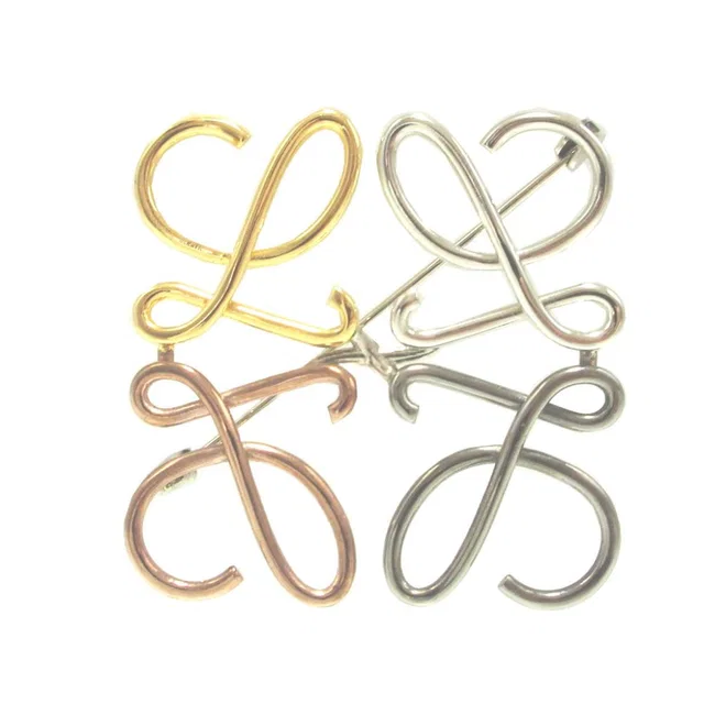 Loewe Anagram Metal Gold Silver Blanc's Gunmetal Brooch in White from The Reluxe