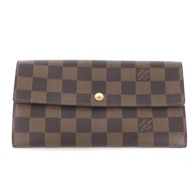Louis Vuitton $$ Damier Ger Wallet in Canvas from The Reluxe