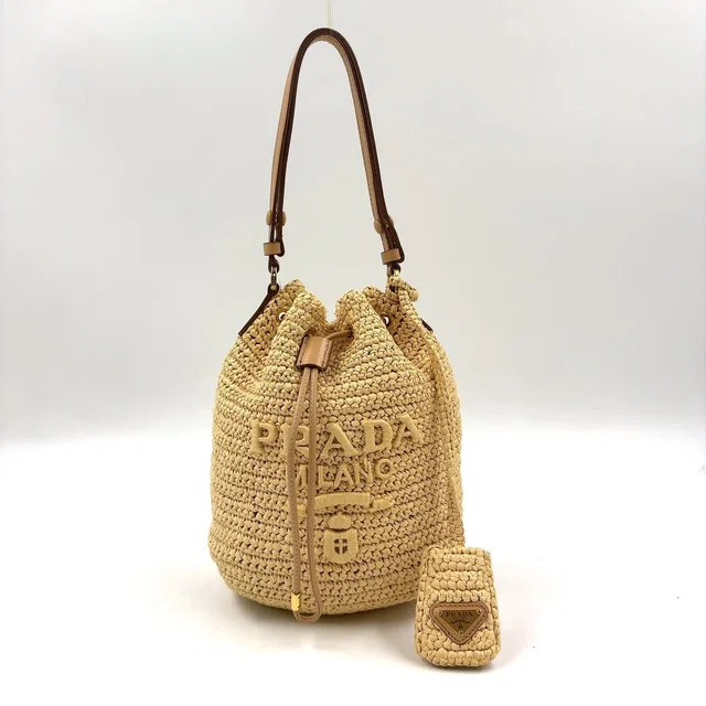 Prada Crochet Letter Ring Logo 2-Way Leather Raffia Beige Light Brown Handbag in Brown Raffia from The Reluxe