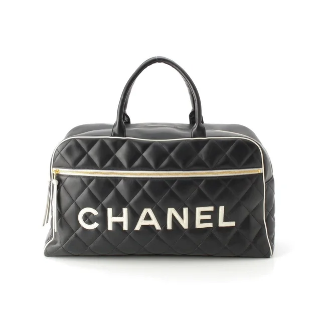 Chanel Quilted Logo Lambskin Boston Bag Black White in Black Lambskin from The Reluxe
