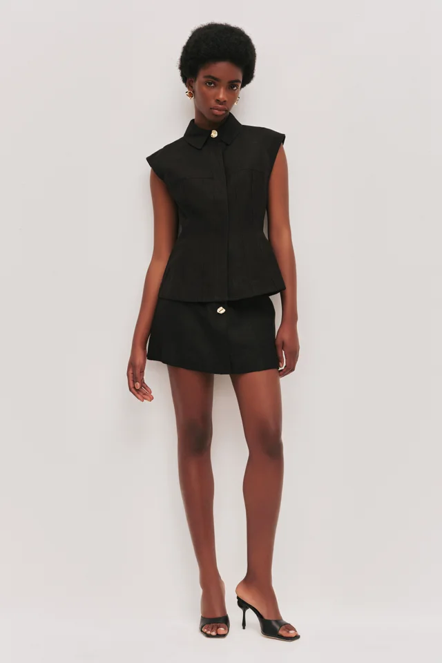 AJE Magnolia Mini Skirt in Black from Aje, photo 1 of 1