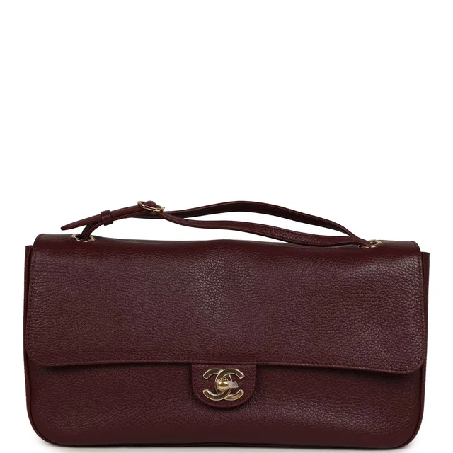 Chanel Maxi "Souplissimo" Small Flap Bag Burgundy Grained Calfskin Gold Hardware in Burgundy Caviar leather from Madison Avenue Couture