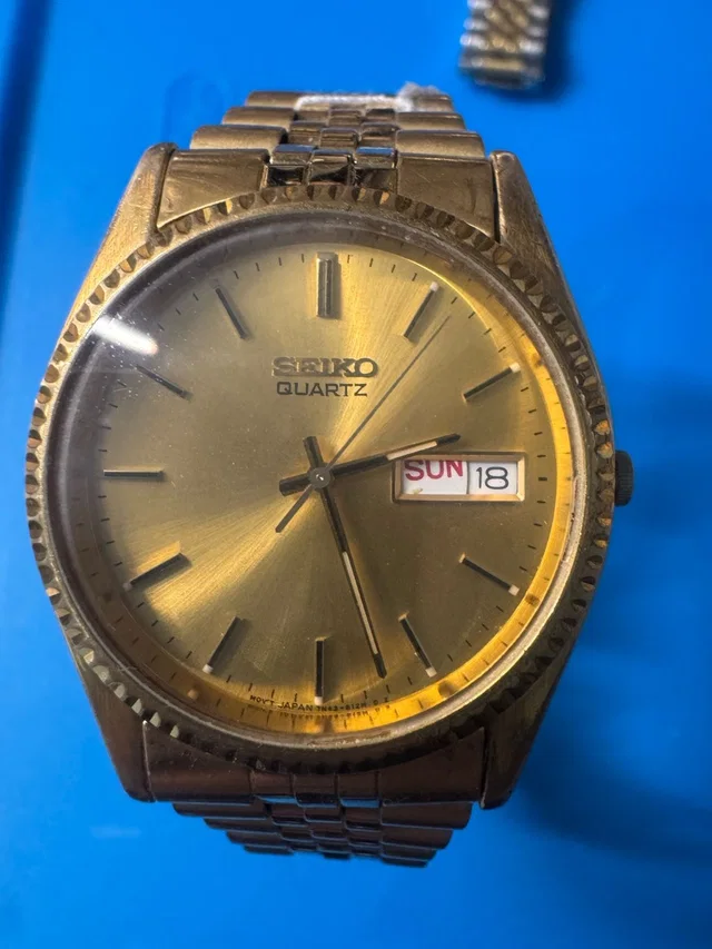 Seiko Tone Sunburst Dial Watch With Day-Date in gold from Poshmark