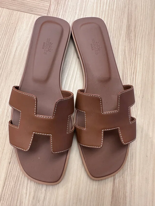 Hermès Gold Oran Slides- Size 40.5 in Gold from Luxury Promise