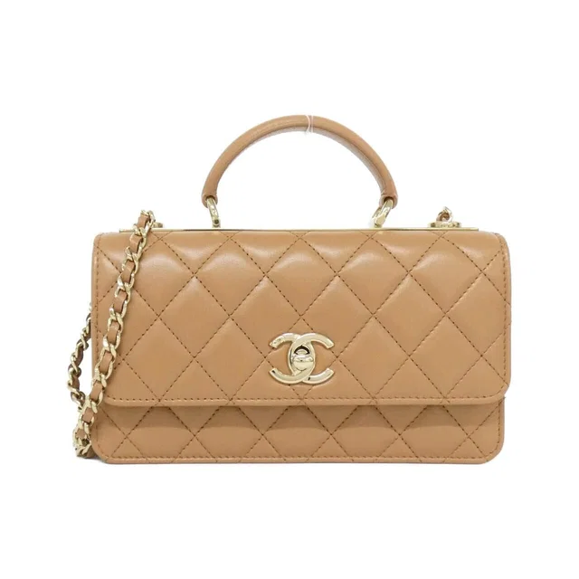 Chanel Chain Clutch Beige in Beige Lambskin from The Reluxe