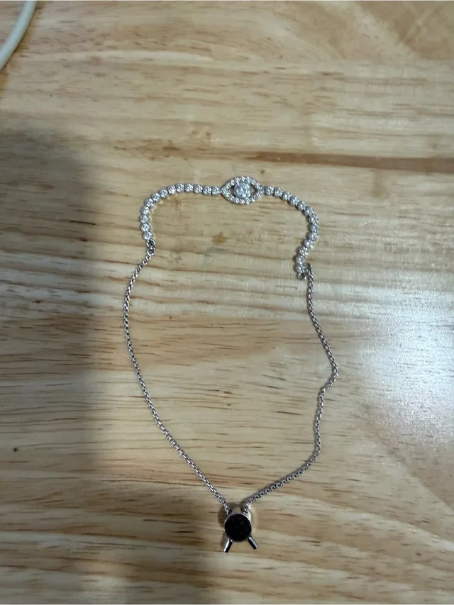 Swarovski Silver Tone Crystal Evil Eye Necklace With Black Pendant in silver|black|gray from Poshmark