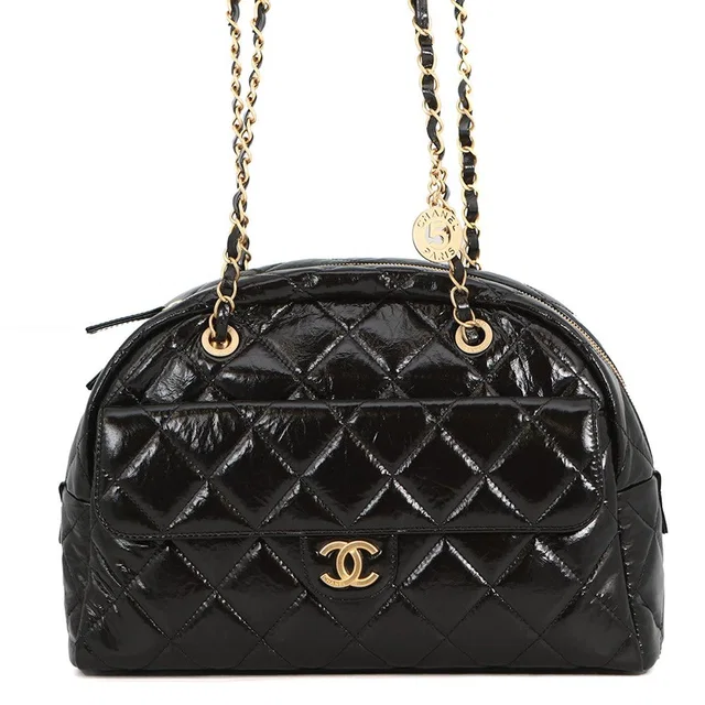 Chanel Shoulder Bag CC Logo Quilted Maxi Shiny Calf Leather Black in Black Calfskin from The Reluxe