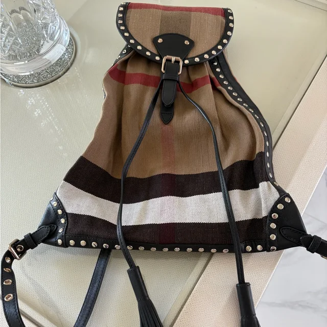 Burberry Tan And Black Check Drawstring Backpack With Stud Trim in black|brown|neutral Canvas from Poshmark