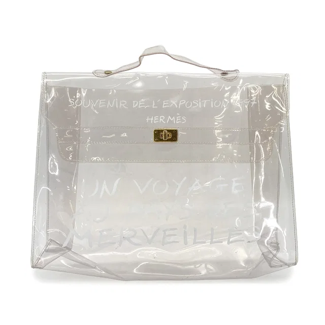 Hermès Vinyl Kelly Souvenir De L' Exposition 1997 Clear Hand Bag Gold Hardware from Luxury Promise