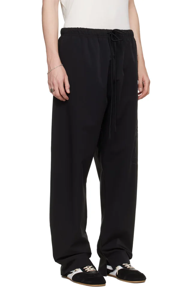 Fear of God ESSENTIALS Black Active Trace Track Pants, photo 2 of 4 from SSENSE