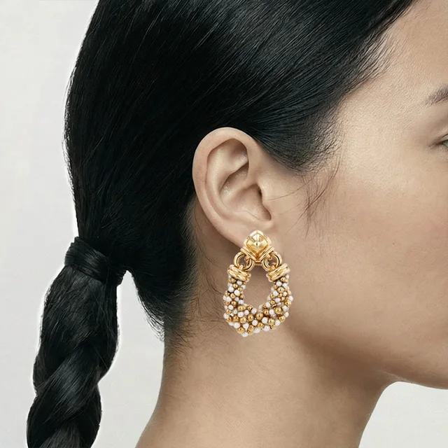 A pair of Bulgari ear clips in Yellow from Collector Square, photo 2 of 2