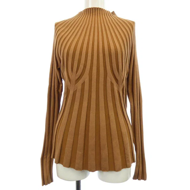 Burberry Tops & shirts from LuxUness