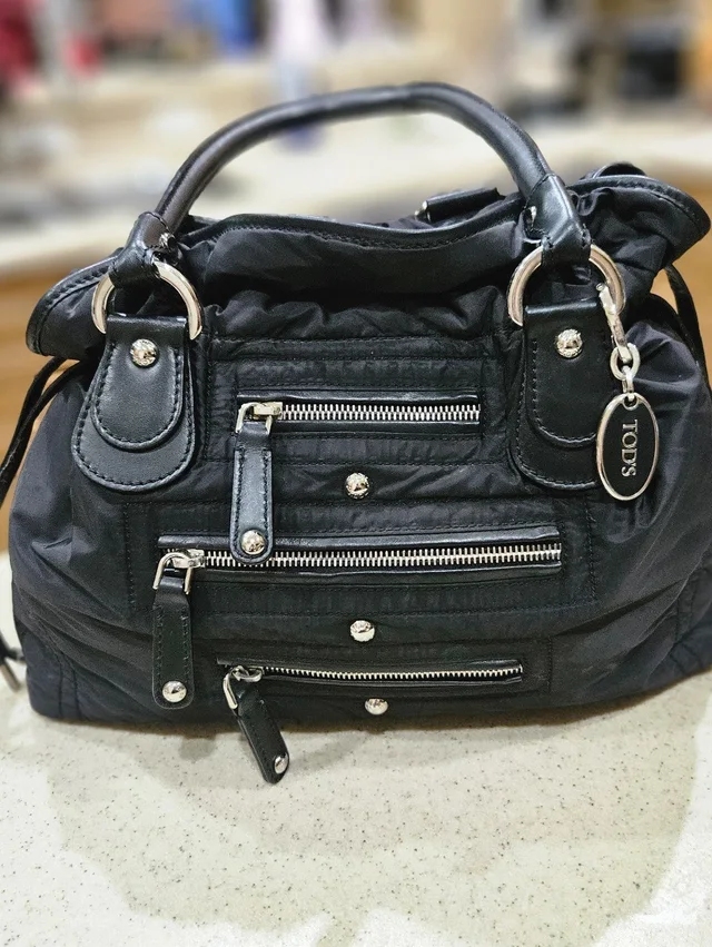 Tods Handbag, Black Nylon Tods Zipper Drawstring Handbag in black Nylon from Poshmark