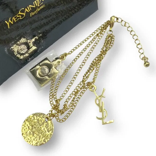 Saint Laurent Yves Bracelet Logo Chain Gold in Gold from The Reluxe