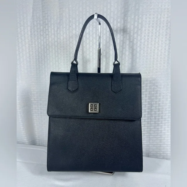 3151: Vintage Givenchy Black Leather Top Handle Bag 4g Logo in black Leather from Poshmark, photo 1 of 1