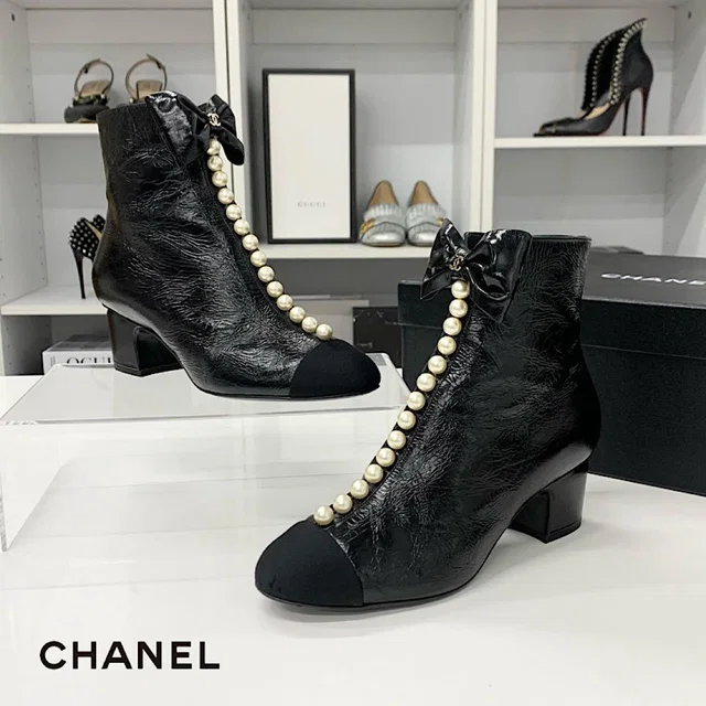 Chanel CC Logo Ribbon Leather Fabric Pearl Short Boots in Leather from The Reluxe