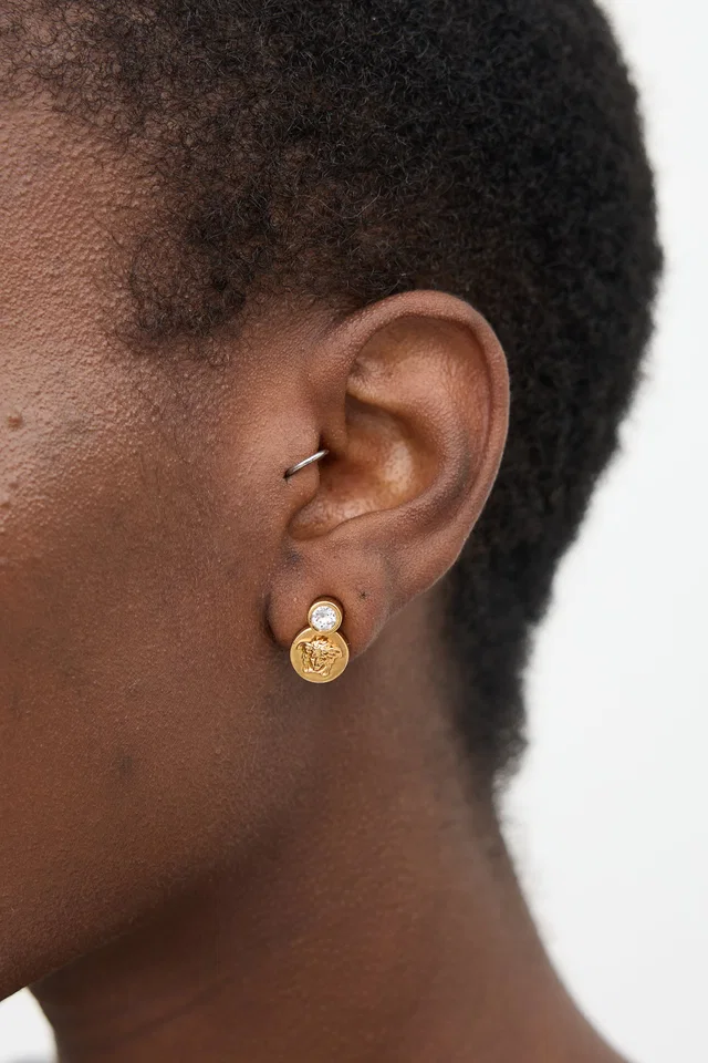 Versace Gold & Crystal Medusa Stud Earrings in Gold from VSP Consignment