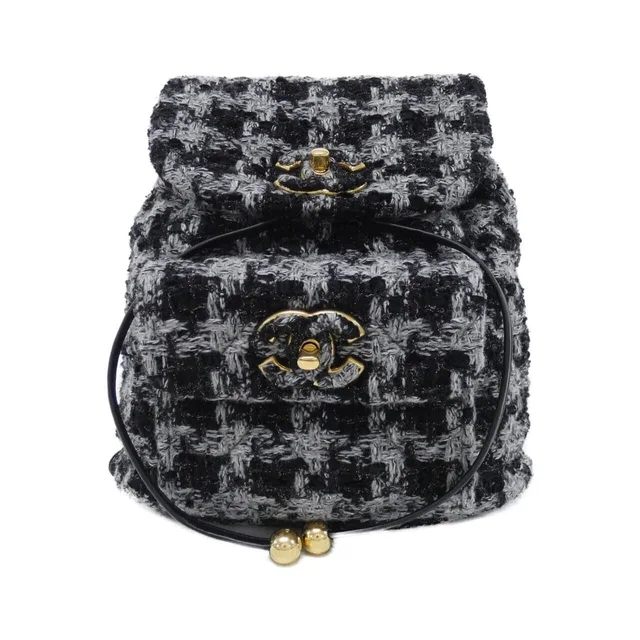 Chanel Backpack Gray in Grey Wool from The Reluxe