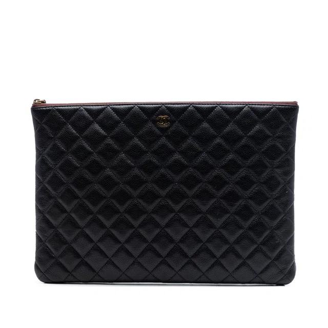 Black Chanel Large Quilted Caviar O Case Clutch in Black Caviar leather from Designer Revival