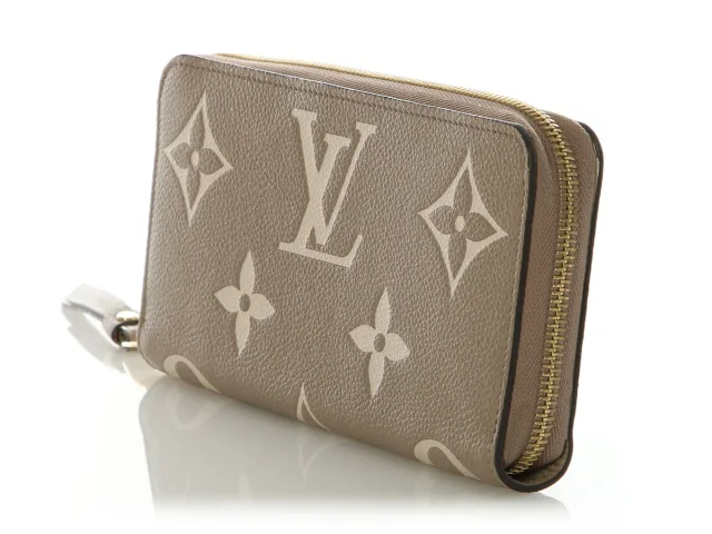 Louis Vuitton Dove and Cream Bicolor Monogram Empreinte Leather Zippy Wallet in White Leather from Ann's Fabulous Finds, photo 3 of 9