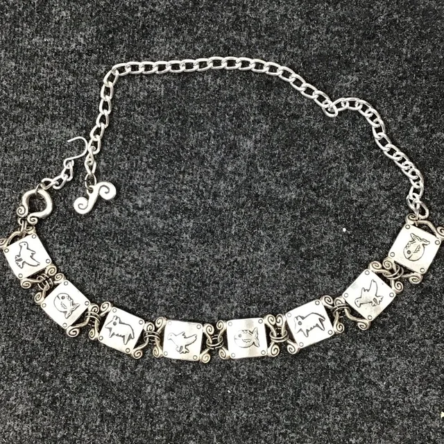 Omega Vintage Silver Petroglyphic Artwork Chain Belt in gray|silver from Poshmark