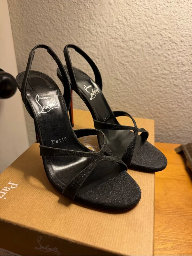 Christian Louboutin Strappy Slingback Heels in black from Poshmark